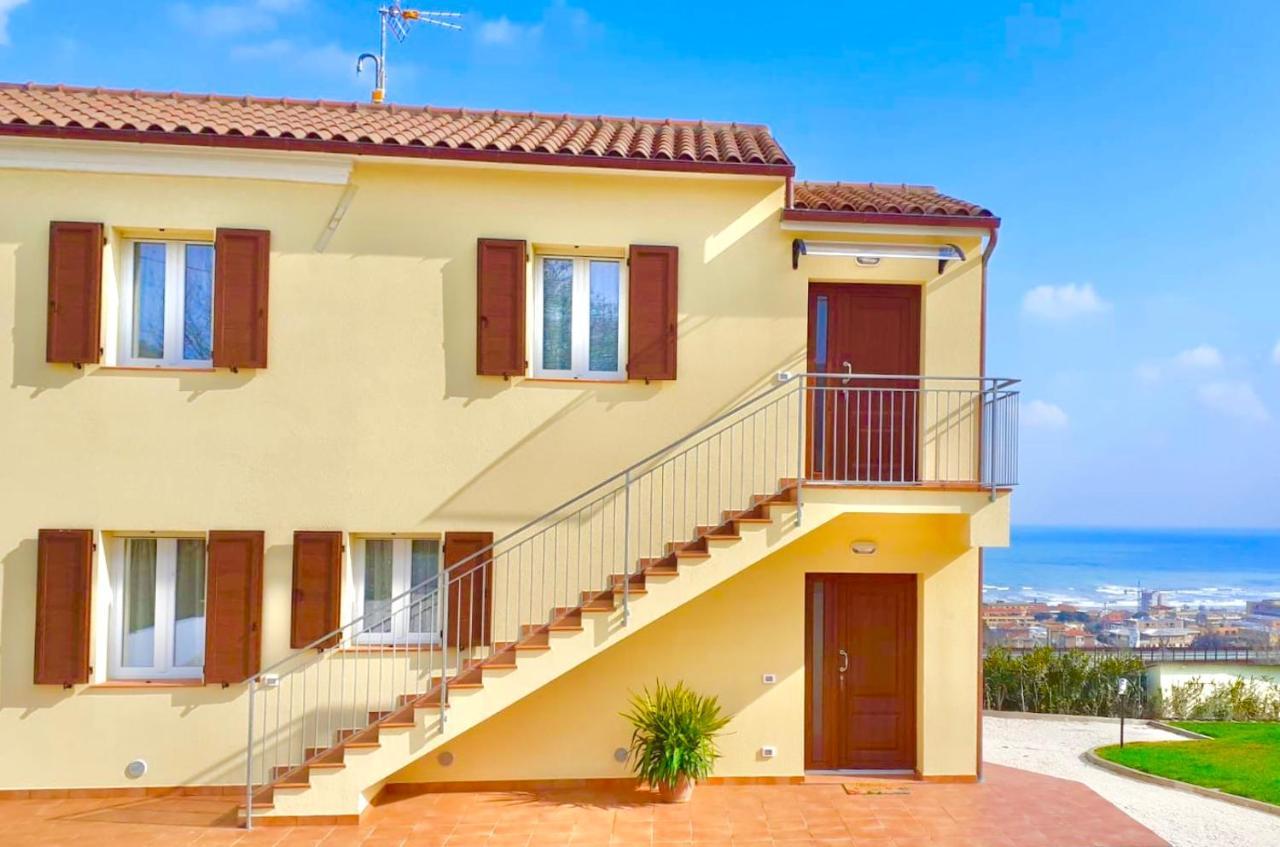 Casa Vacanze Con Vista Mare E Giardino - Amanecer 塞尼加利亚马尔佐卡 外观 照片